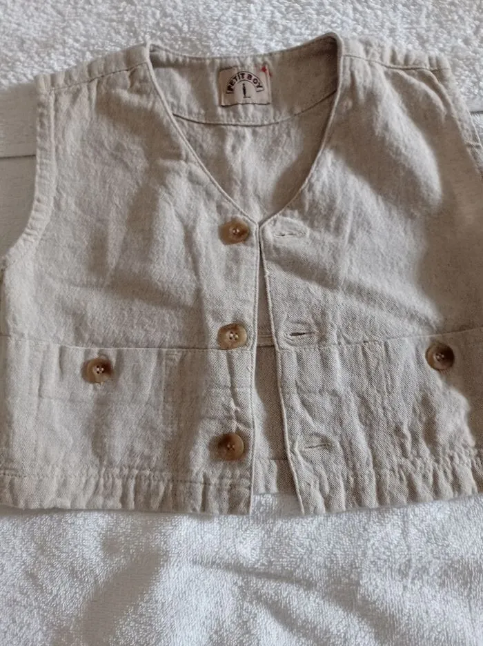 Sleeveless linen vest formal for parties or weddings or simply wear with a top.