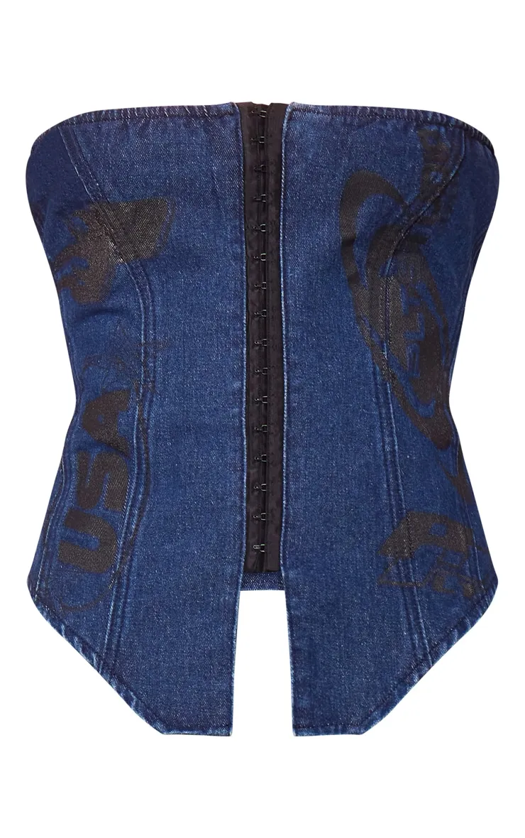 Top bustier en jean bleu moyen délavé à crochets et oeillets et détail graphique